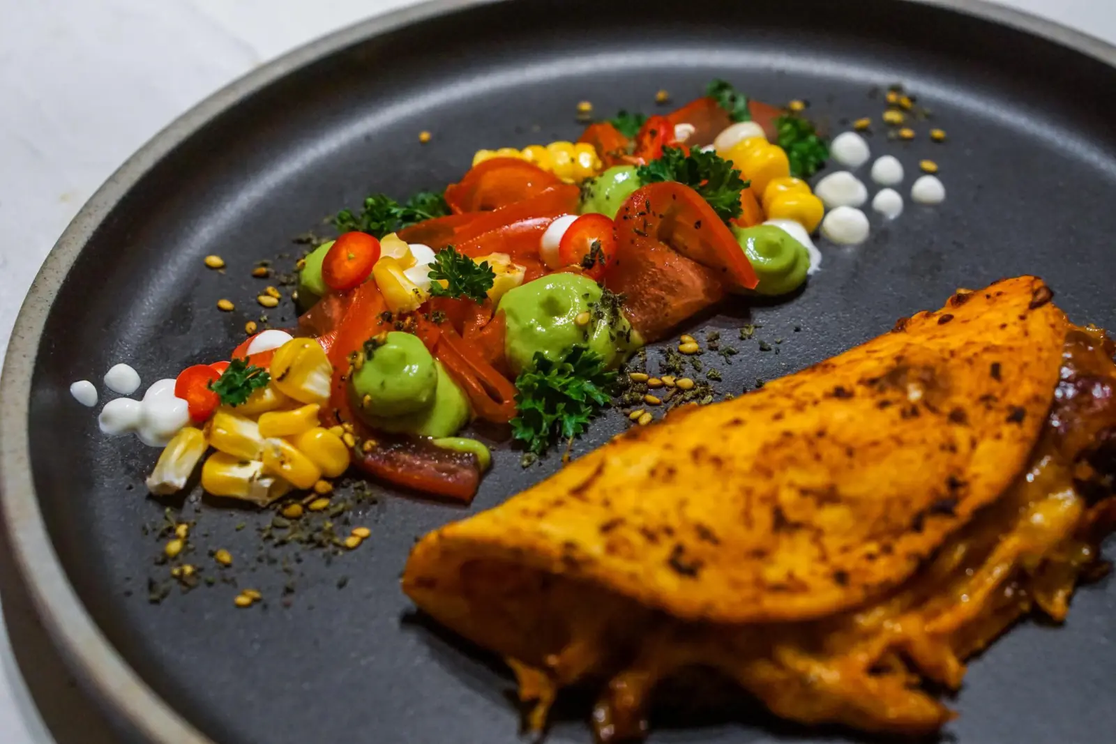 Fine dining style birria taco with elegant plating