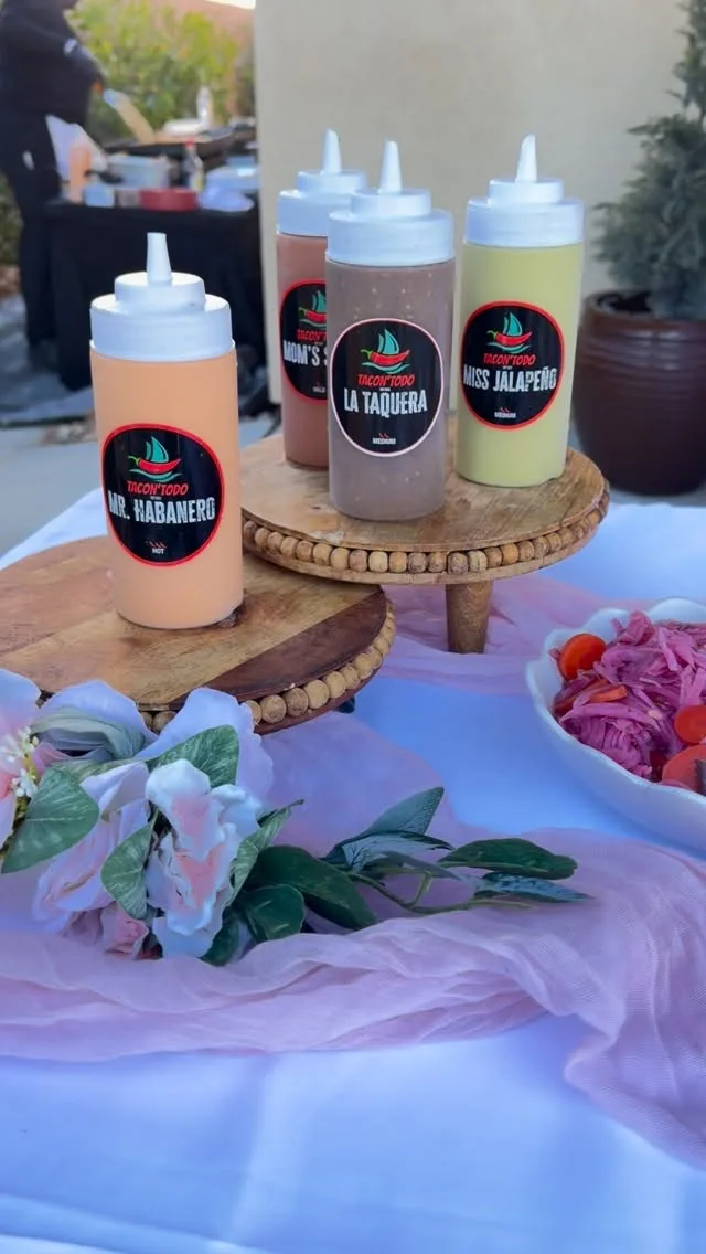 TacoNTodo salsas displayed at a bridal shower catering event