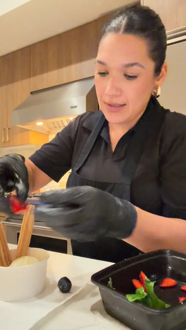Preparing churros with fresh strawberries for a private dinner