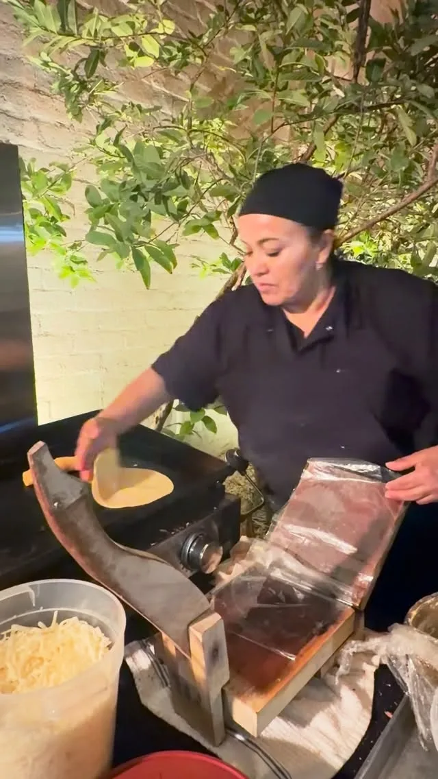 Gabby making handmade tortillas at a private catering event