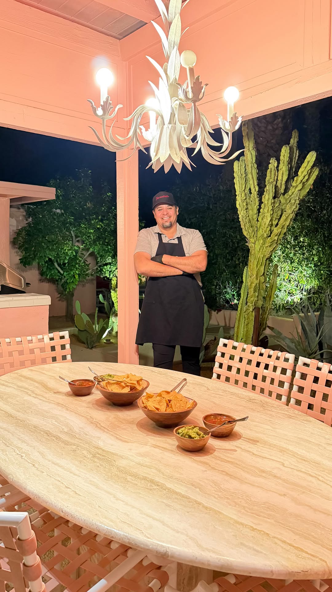 Omar at a bachelorette party catering setup with elegant decor
